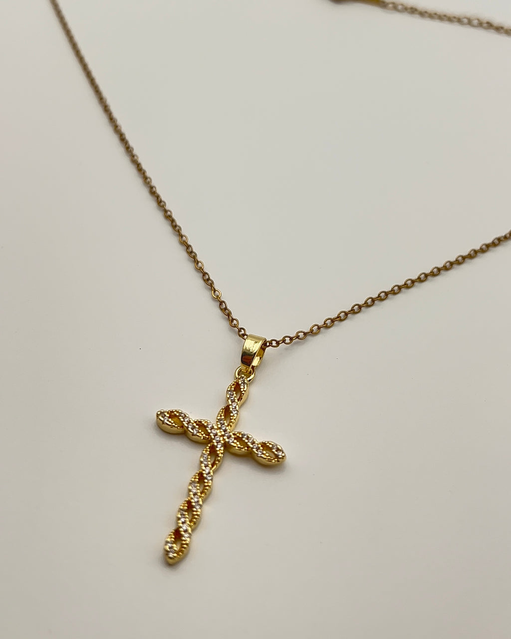 TWISTED GOLD CROSS NECKLACE