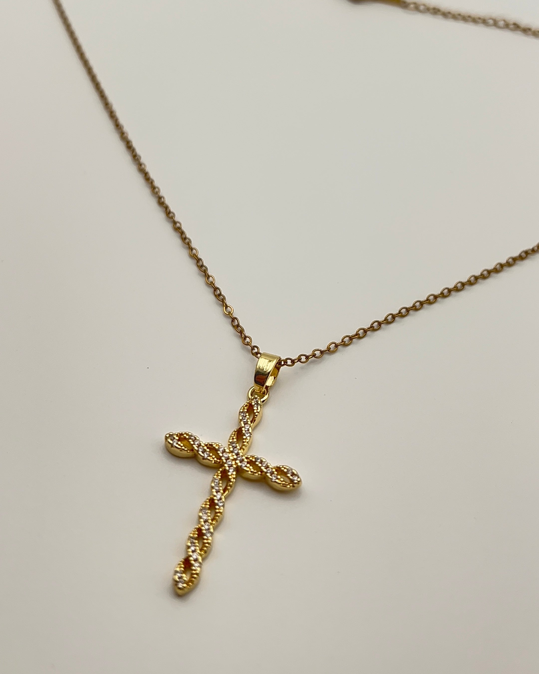 TWISTED GOLD CROSS NECKLACE